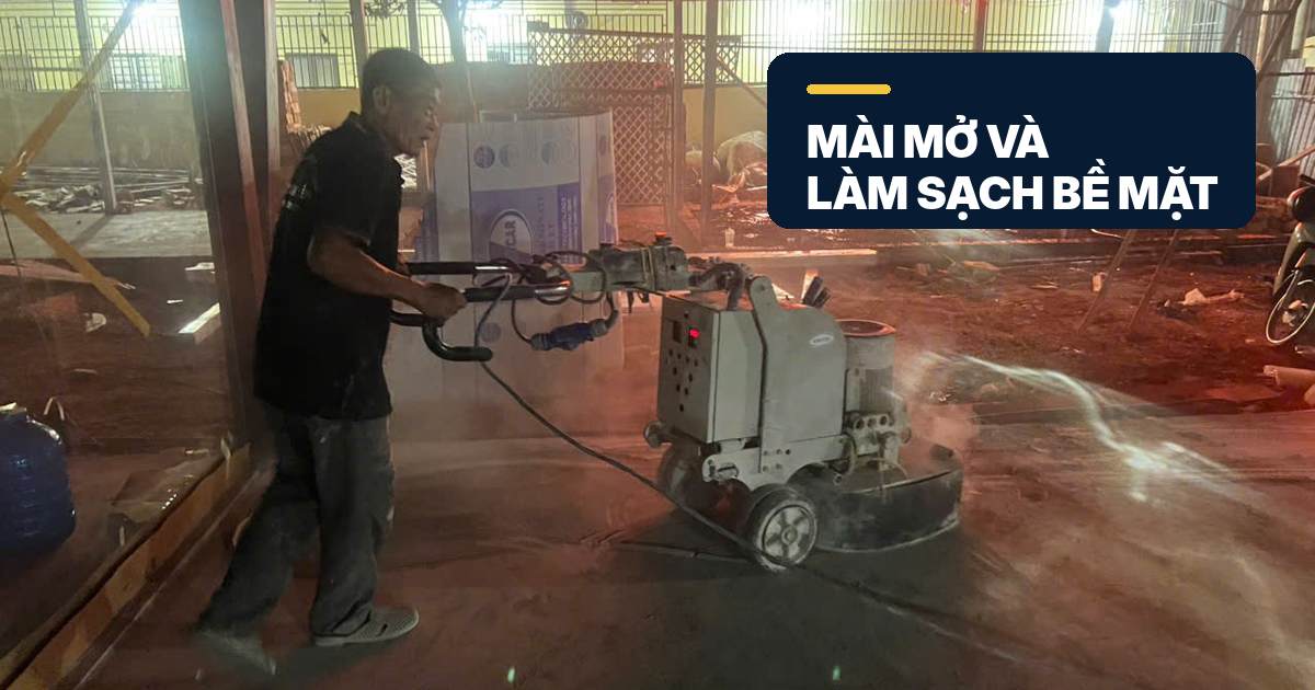 Mài mở và làm sạch khu vực sàn bê tông bị rỗ mài mở bề mặt và làm sạch lỗ rỗ trên sàn bê tông